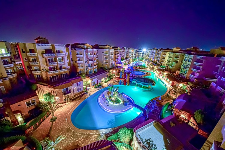 chalet in front of the swimming pool